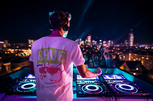 dj playing wearing a rave savvy tshirt